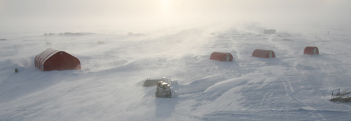 Drifting snow in camp. Where does the ice end and where does the sky begin?