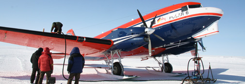Polar 6 is being refueled. This plane was built in 1942. It has been outfitted with two modern turbine propeller engines, new cockpit instrumentation and is still going strong.