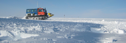 The Flexmobil tracked vehicle drags a groomer on the skiway.