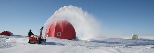 Hans Christian operates the snowblower 