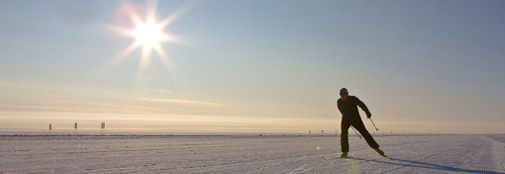 A skilled skier skating on the hard skiway at NEEM.