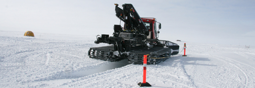 The Pistenbully for service. A service trench has been made in the snow. All oil and spill is collected and sent to Kangerlussuaq of course.